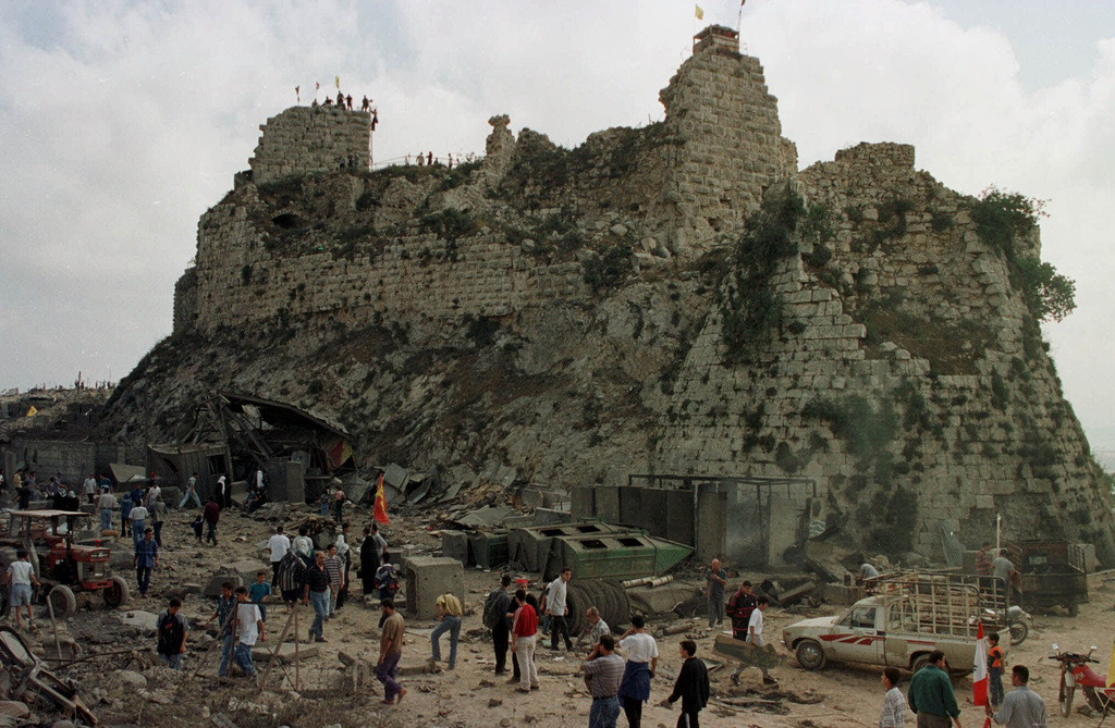 FILE -Villagers inspect the damage to Beaufort Castle, 10 kilometers (6 miles) northwest of the southern market town of Nabatiyeh, Lebanon, Wednesday, May 24, 2000. (AP Photo/Ahmed Mantash, File)