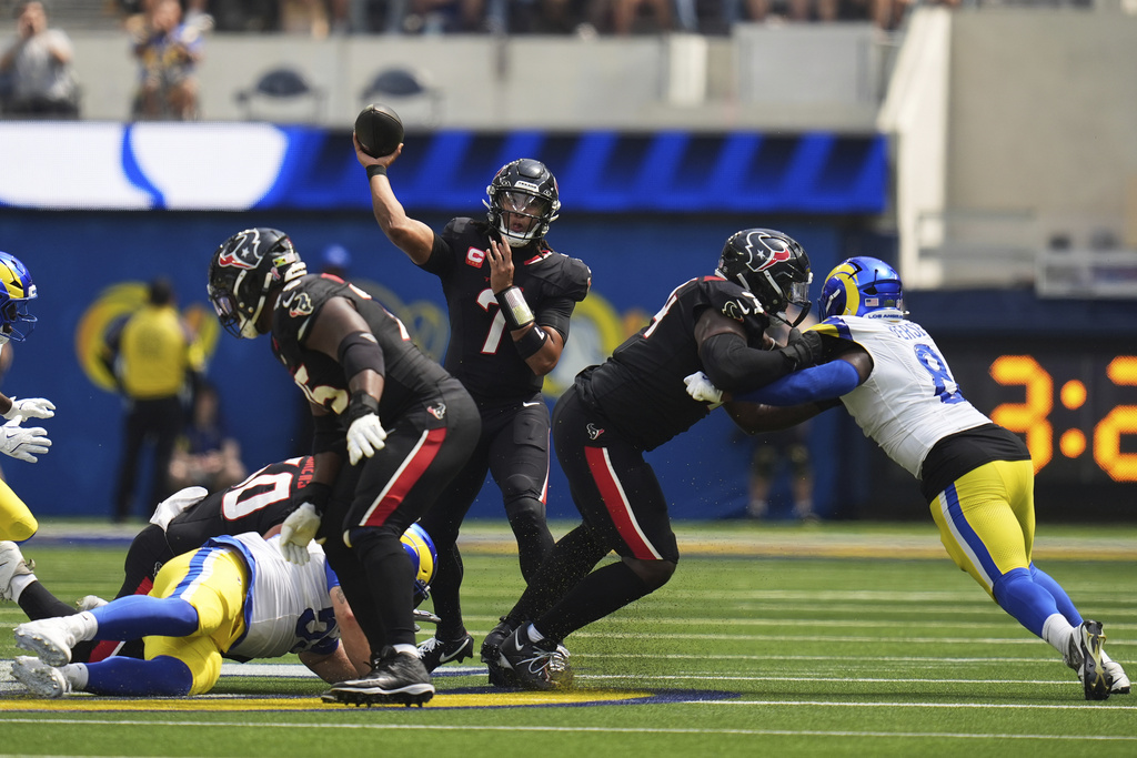 Houston Texans quarterback C.J. Stroud (7) passes against the Los Angeles Rams during the first half of an NFL football game, Sunday, Sept. 7, 2025, in Inglewood, Calif. (AP Photo/Gregory Bull)