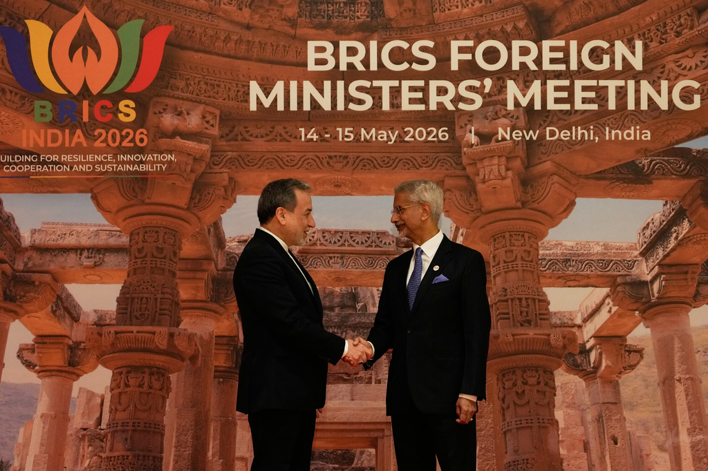 India's Foreign Minister S.Jaishankar, right, shakes hands with Iranian Foreign Minister Abbas Araghchi as he arrives for a two-day BRICS nations meeting in New Delhi, India, Thursday, May 14, 2026. (AP Photo/Manish Swarup)