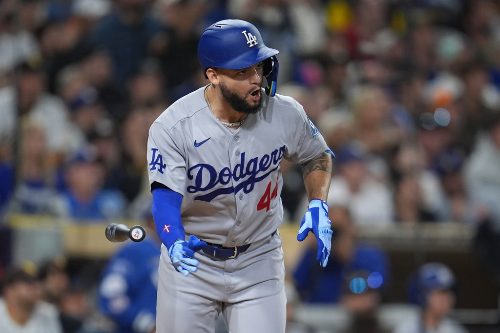 Los Angeles Dodgers' Andy Pages reacts after hitting a sacrifice fly during the ninth inning of a baseball game against the San Diego Padres Tuesday, May 19, 2026, in San Diego. (AP Photo/Gregory Bull)