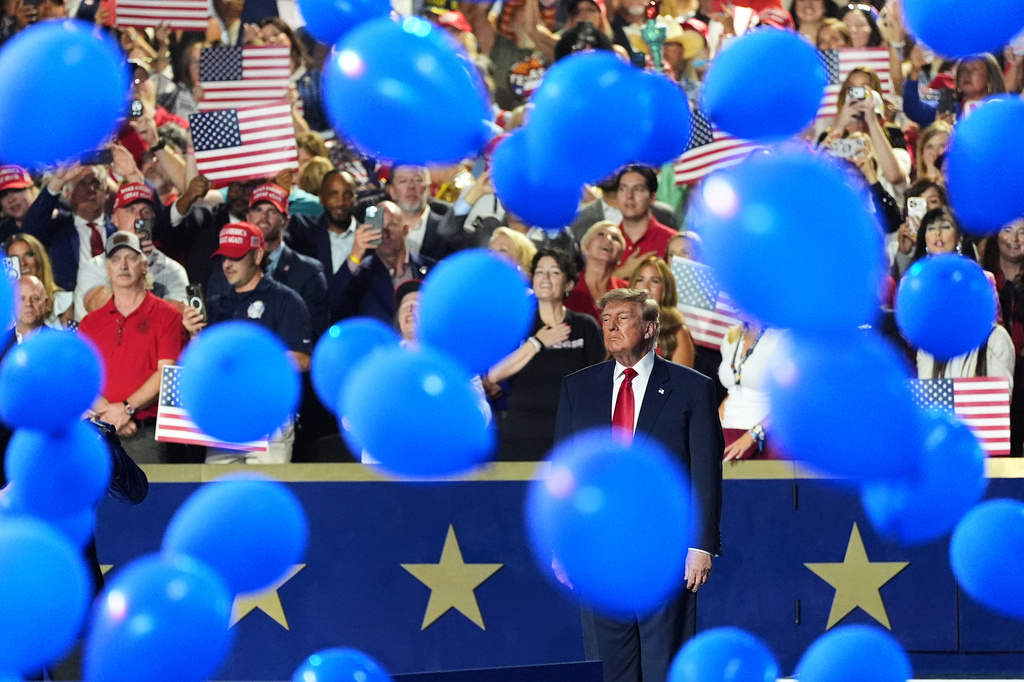 President Donald Trump watches as balloons fall at the Republican convention Thursday, Sept. 10, 2026, in Dallas. (AP Photo/Alex Brandon)