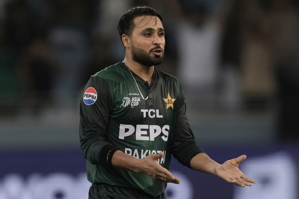 Pakistan's Faheem Ashraf celebrates the dismissal of Oman's Hassnain Shah during the Asia Cup Cricket match between Oman and Pakistan at Dubai International Cricket stadium in Dubai, United Arab Emirates, Friday, Sept. 12, 2025. (AP Photo/Fatima Shbair)