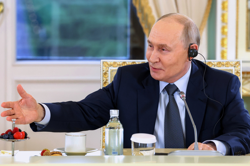 Russian President Vladimir Putin gestures during a meeting with representatives of international news agencies on the sidelines of the St. Petersburg International Economic Forum at the Constantine Palace in St. Petersburg, Russia, on Thursday, June 4, 2026. (Alexander Kazakov, Sputnik, Kremlin Pool Photo via AP)