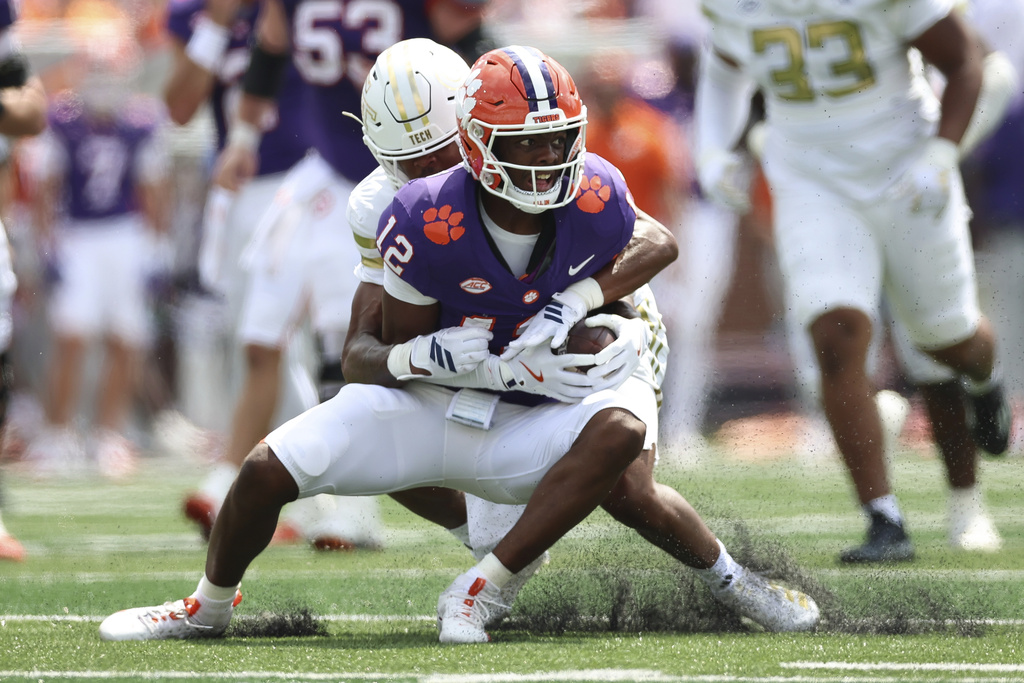 Clemson wide receiver Bryant Wesco Jr. (12) catches a pass during the first half of an NCAA college football game against Georgia Tech, Saturday, Sept. 13, 2025, in Atlanta. (AP Photo/Colin Hubbard)