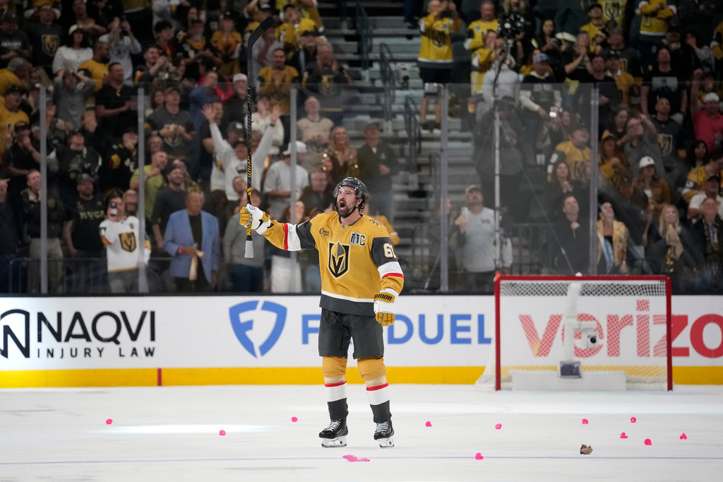 Vegas Golden Knights right wing Mark Stone celebrates after the Golden Knights won in the second overtime in Game 3 of the NHL hockey Stanley Cup Final series against the Carolina Hurricanes, Saturday, June 6, 2026, in Las Vegas. (AP Photo/John Locher)