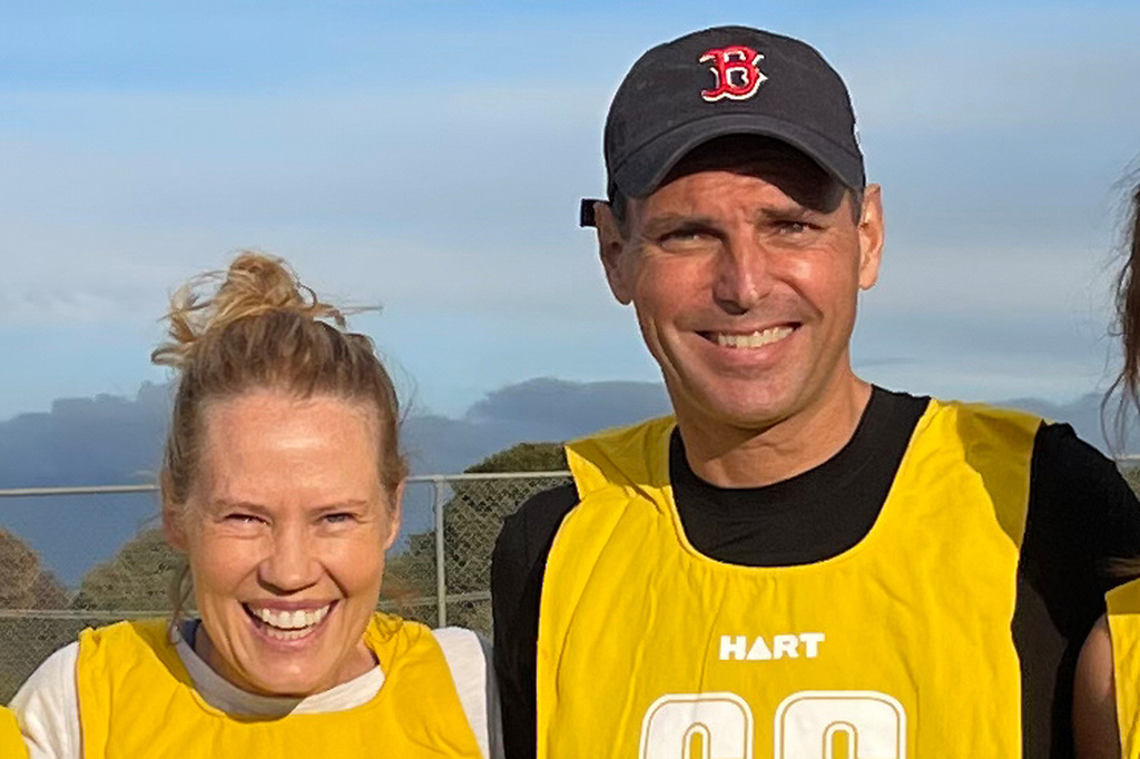 This undated handout photo from Saffrine Duggan shows Daniel Duggan, right, and his wife, Saffrine, as they pose for a photo, in Australia. (Saffrine Duggan via AP)