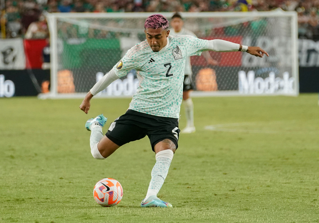 FILE _ Mexico's Julian Araujo (2) plays the ball during the first half of a CONCACAF Gold Cup soccer match against Haiti Thursday, June 29, 2023, in Glendale, Ariz. (AP Photo/Darryl Webb, File)