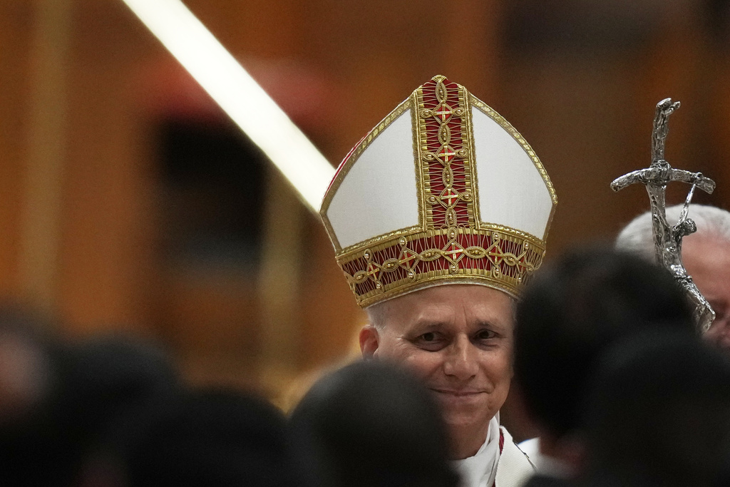 Pope Leo XIV leaves after a Mass for the opening of the academic year of the Pontifical University and for the Jubilee of the Educational World in St. Peter's Basilica at the Vatican, Monday, Oct. 27, 2025. (AP Photo/Alessandra Tarantino)