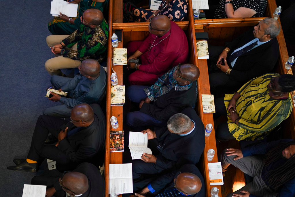 People attend a service, in London, Sunday, Sept. 6, 2026, for the "remembrance, justice and repair" before filing a petition to refer three specific questions about trans-Atlantic slavery to the Judicial Committee of the Privy Council. (AP Photo/Alberto Pezzali)