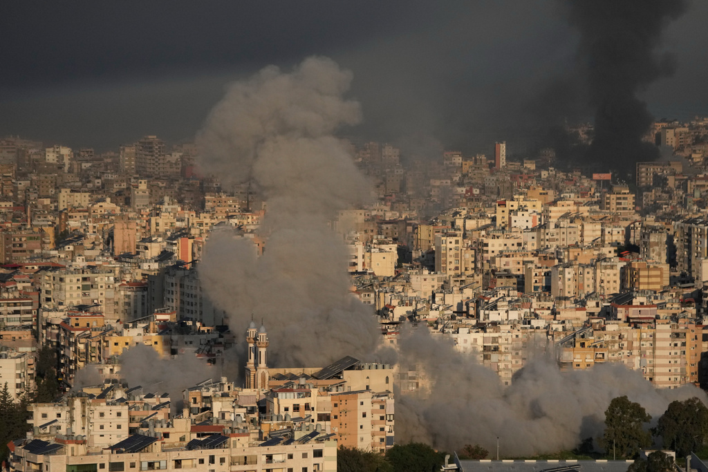 Smoke rises from Israeli airstrikes in Dahiyeh, a southern suburb of Beirut, Lebanon, Tuesday, March 3, 2026. (AP Photo/Hussein Malla)