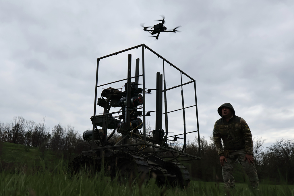 In this photo provided by Ukraine's 65th Mechanised Brigade press service on April 10, 2026, a Ukrainian serviceman looks at FPV drone takeoff during a training at the polygon in Zaporizhzhia region, Ukraine. (Andriy Andriyenko/Ukraine's 65th Mechanised Brigade via AP)