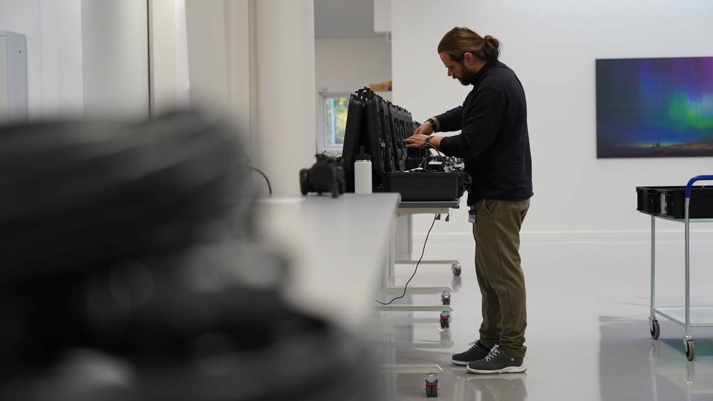 A worker packs away assembled counter drone devices at MyDefence's headquarters in Alborg, Denmark on Oct. 28, 2025. (AP Photo/James Brooks)