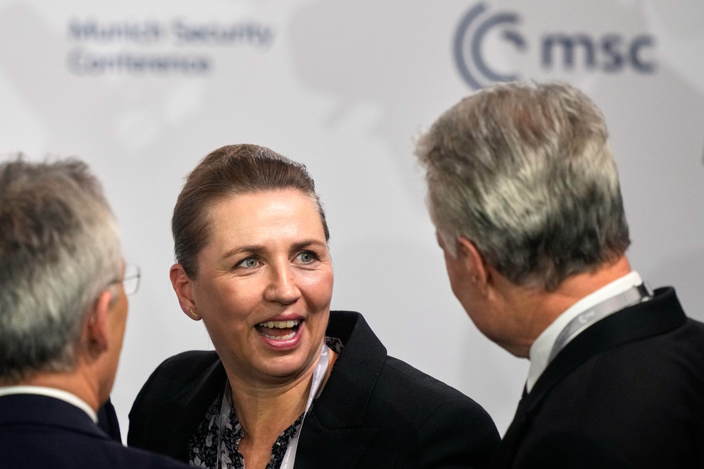 From left, Norway's Finance Minister Jens Stoltenberg, Denmark's Prime Minister Mette Frederiksen and Lithuania's President Gitanas Nauseda speak prior to a panel discussion during the Munich Security Conference in Munich, Germany, Friday, Feb. 13, 2026. (AP Photo/Michael Probst)
