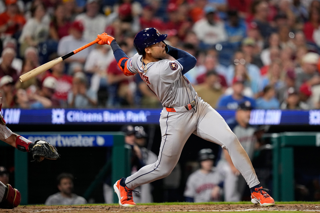 Houston Astros' Cam Smith follows through after hitting a home run against Philadelphia Phillies pitcher Andrew Painter during the fourth inning of a baseball game Tuesday, Sept. 8, 2026, in Philadelphia. (AP Photo/Matt Slocum)