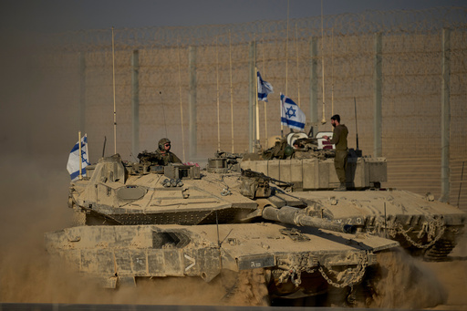 Israeli tanks move along the Israeli-Gaza border as seen from southern Israel, Monday, Oct. 20, 2025. (AP Photo/Ohad Zwigenberg) Israeli tanks move along the Israeli-Gaza border as seen from southern Israel, Monday, Oct. 20, 2025. (AP Photo/Ohad Zwigenberg)