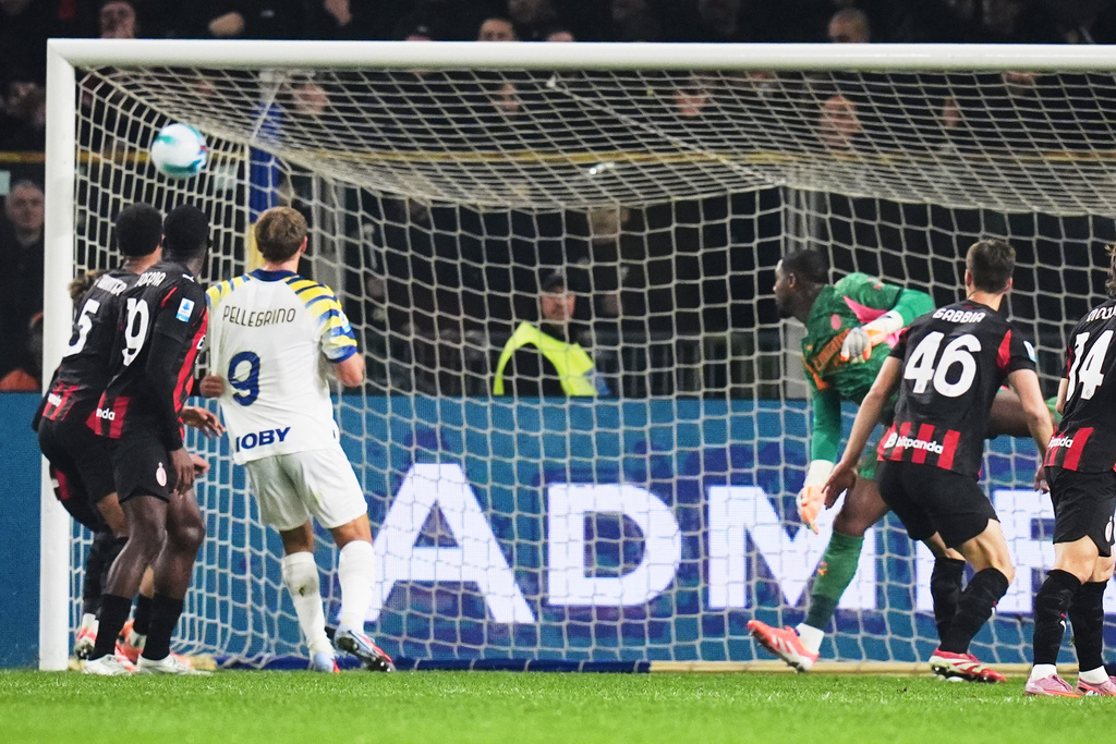 Parma's Adrian Bernabe scores a goal on Milan during the Serie A soccer match in Parma, Italy, Sunday, Nov. 8, 2025. (Massimo Paolone/LaPresse via AP)