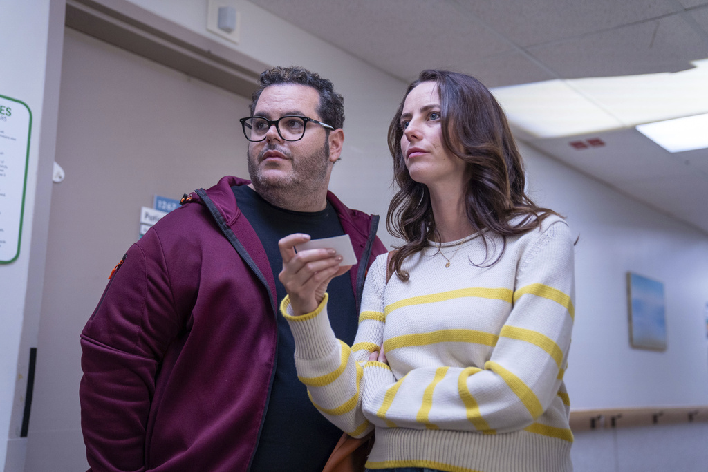 This image released by Republic Pictures shows Josh Gad, left, and Kaya Scodelario in a scene from "Adulthood." (Albert Camicioli/Republic Pictures via AP)