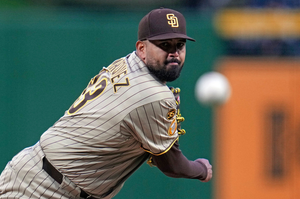 San Diego Padres pitcher Germán Márquez delivers during the first inning of a baseball game against the Pittsburgh Pirates in Pittsburgh, Monday, April 6, 2026. (AP Photo/Gene J. Puskar)