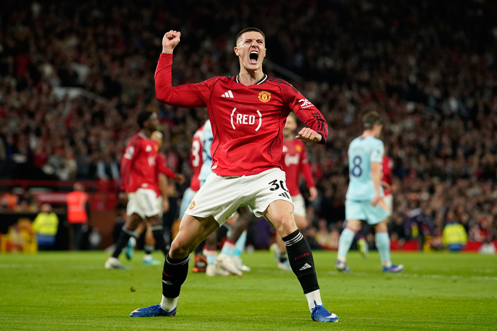 Manchester United's Benjamin Sesko celebrates after scoring during the Premier League soccer match between Manchester United and Brentford in Manchester, England, Monday, April 27, 2026. (AP Photo/Dave Thompson)