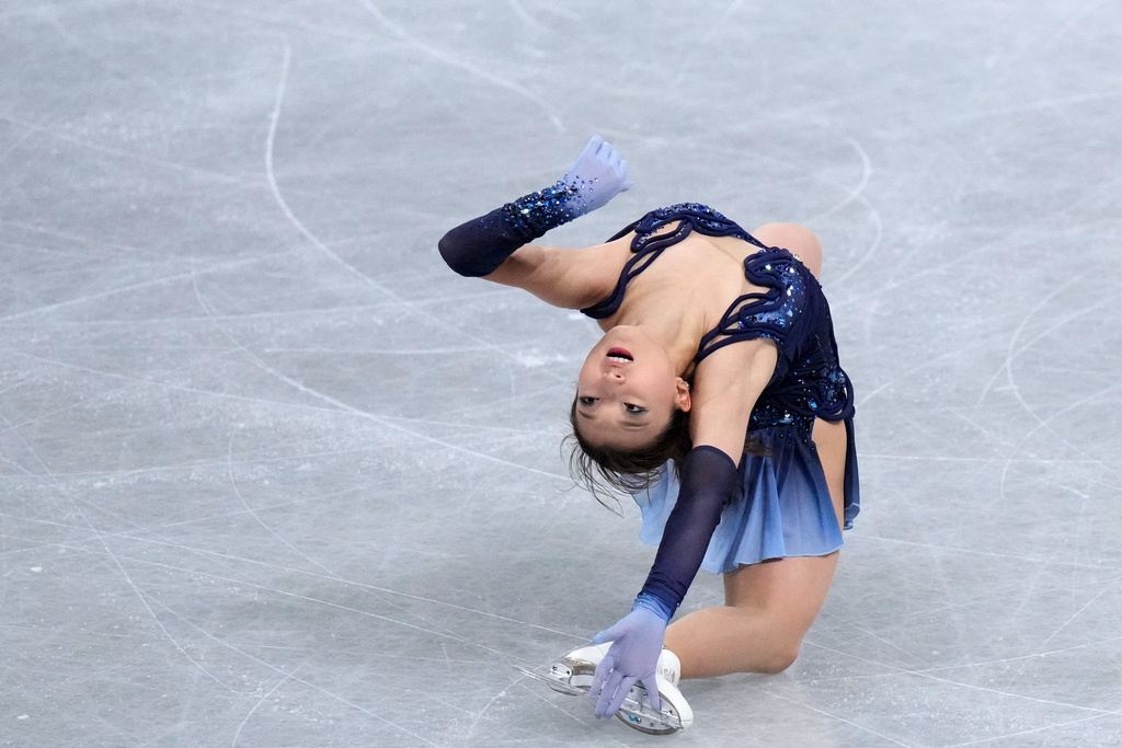 Kaori Sakamoto, of Japan, competes in the women's short program segment at the ISU Grand Prix of Figure Skating Final in Nagoya, central Japan, Friday, Dec. 5, 2025. (AP Photo/Hiro Komae)