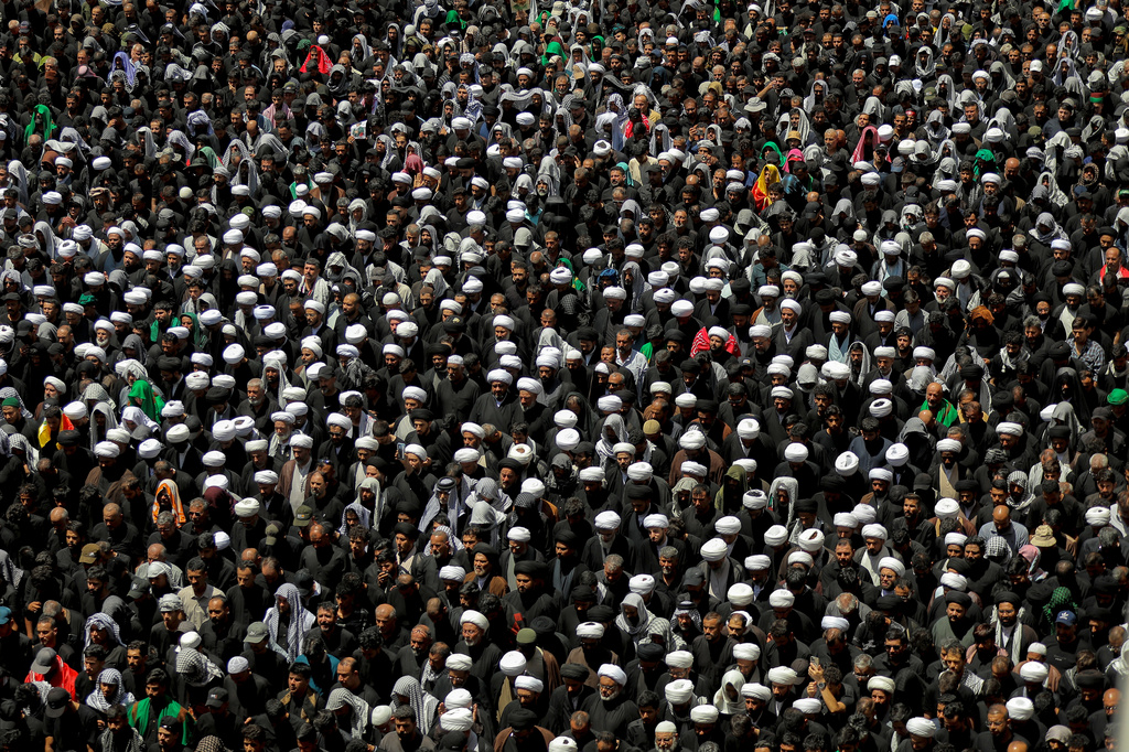 Mourners gather in prayer during the funeral procession for the late Iranian Supreme Leader Ayatollah Ali Khamenei inside the Imam Ali Shrine in Najaf, Iraq, Wednesday, July 8, 2026. (AP Photo/Anmar Khalil)