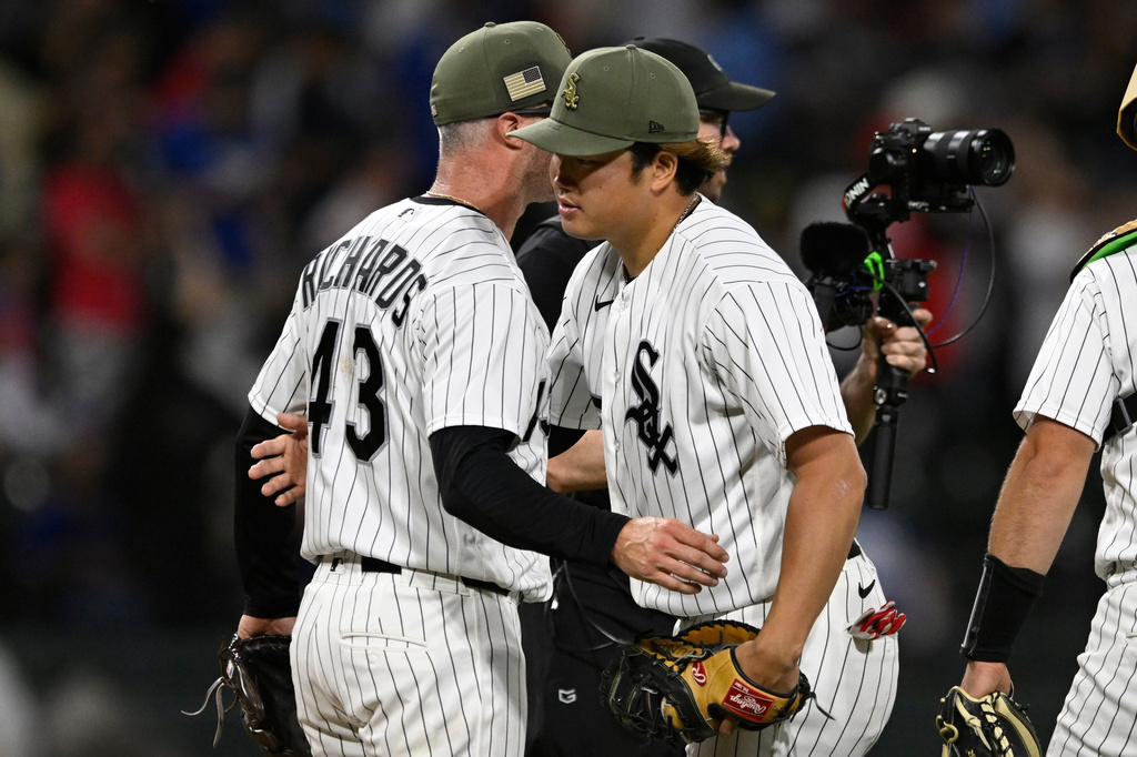 Chicago White Sox's Munetaka Murakami, right, celebrates with closing pitcher Trevor Richards (43) after defeating the Chicago Cubs in a baseball game in Chicago, Saturday, May 16, 2026. (AP Photo/Paul Beaty)