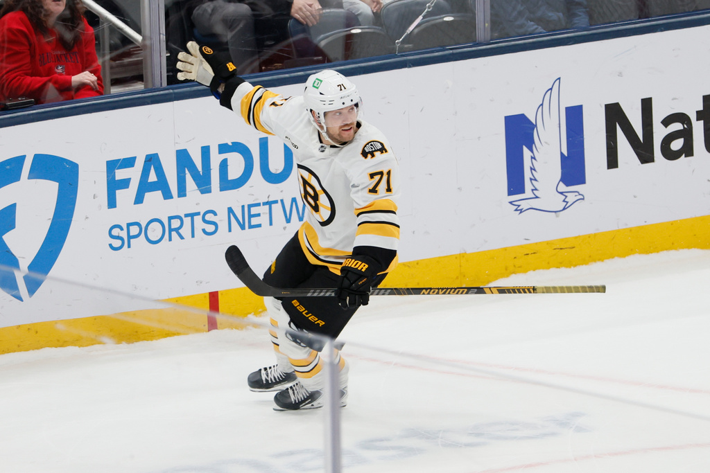 Boston Bruins' Viktor Arvidsson celebrates his game-winning goal against the Columbus Blue Jackets during the shootout of an NHL hockey game, Sunday, March 29, 2026, in Columbus, Ohio. (AP Photo/Jay LaPrete)