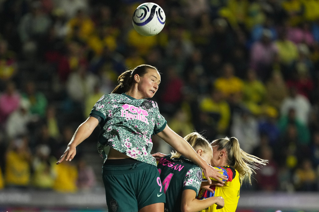 Tara Rudd of The United States' Washington Spirit jumps for the ball during the Women's CONCACAF Champions Cup final soccer match against Mexico's America in Pachuca, Mexico, Saturday, May 23, 2026.(AP Photo/Fernando Llano)