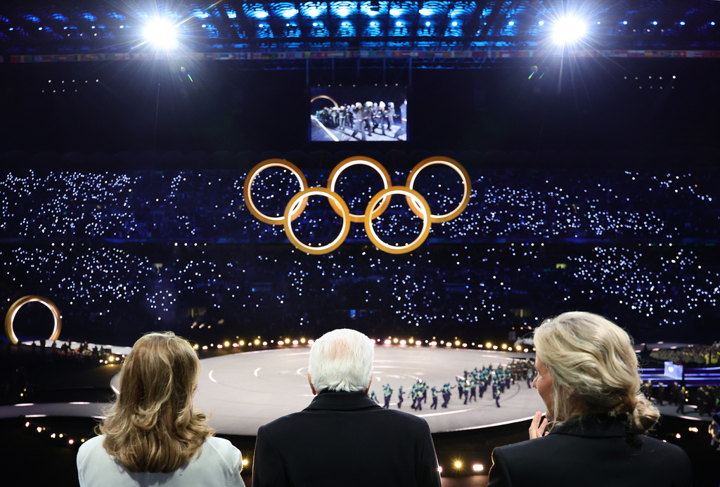 Sergio Mattarella President of Italy, center, his wife Laura Mattarella, left, and Kirsty Coventry President of the IOC attend the Olympic opening ceremony at the 2026 Winter Olympics, in Milan, Italy, Friday, Feb. 6, 2026. (Andreas Rentz/Pool Photo via AP)