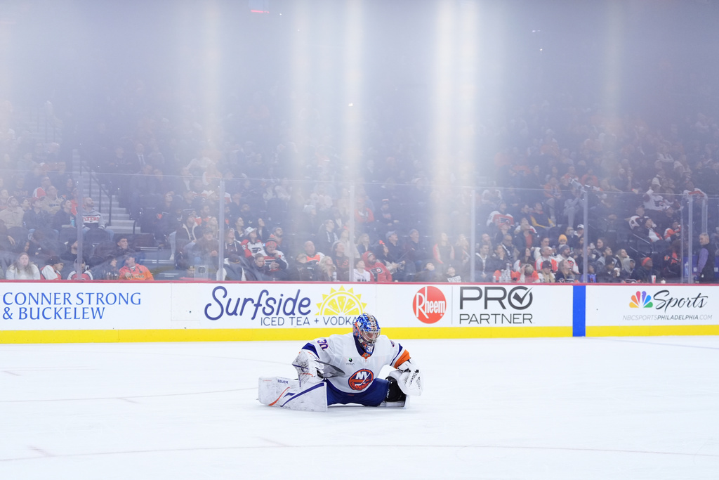 New York Islanders' Ilya Sorokin stretches during the second period of an NHL hockey game against the Philadelphia Flyers Monday, Jan. 26, 2026, in Philadelphia. (AP Photo/Matt Slocum)
