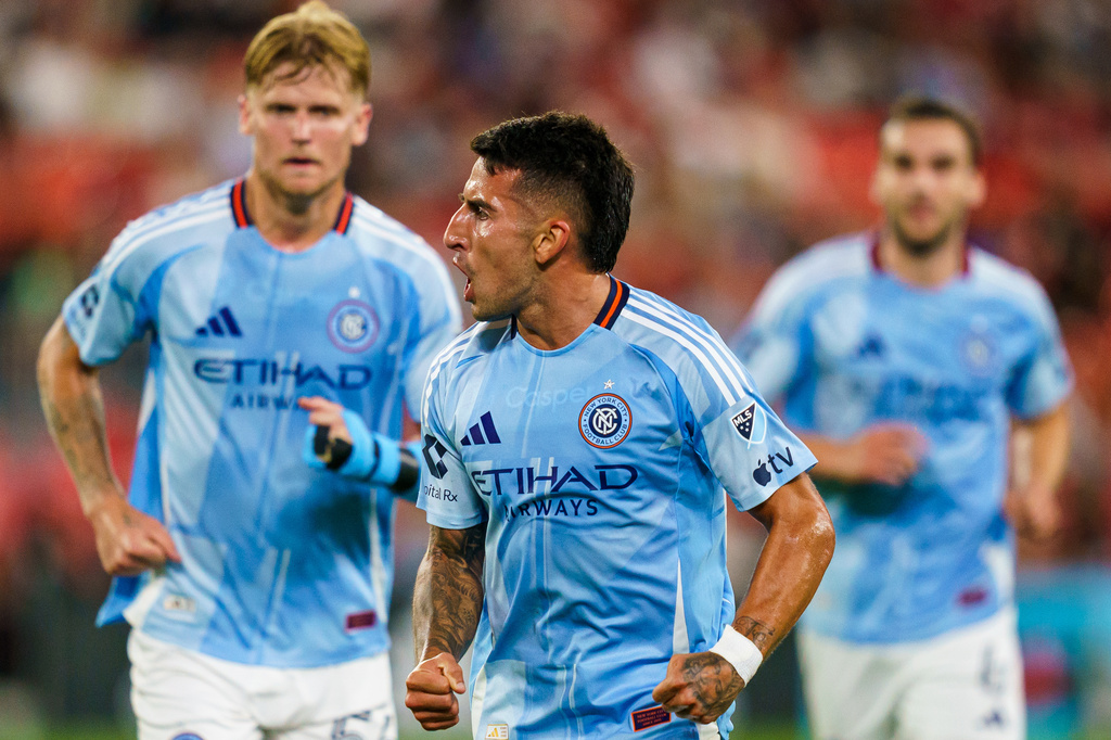 New York City FC's Nicolas Fernandez, center, celebrates after scoring against Toronto FC during the first half of an MLS soccer match in Toronto, Saturday, Aug. 29, 2026. (Keito Newman/The Canadian Press via AP)