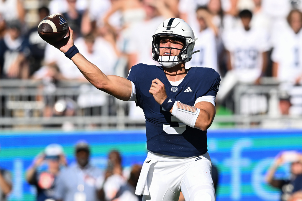 Penn State quarterback Rocco Becht looks to throw a pass against Marshall during the second quarter of an NCAA college football game, Saturday, Sept. 5, 2026, in State College, Pa. (AP Photo/Barry Reeger)