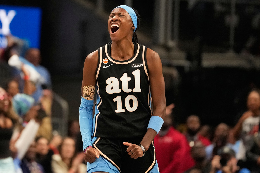 Atlanta Dream guard Rhyne Howard (10) celebrates scoring during the first half of Game 3 of the WNBA basketball finals against the Golden State Valkyries on Wednesday, Oct. 21, 2026, in Atlanta. (AP Photo/Brynn Anderson)