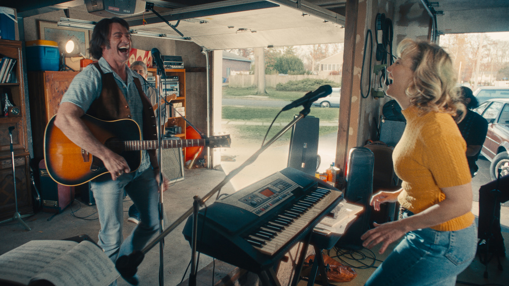 This image released by Focus Features shows Hugh Jackman and Kate Hudson, right, in a scene from "Song Sung Blue." (Focus Features via AP)