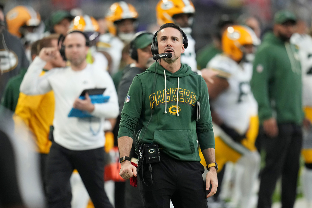 Green Bay Packers head coach Matt Lafleur watches from the sideline during the second half of an NFL football game against the Minnesota Vikings, Sunday, Jan. 4, 2026, in Minneapolis. (AP Photo/Ross D. Franklin)