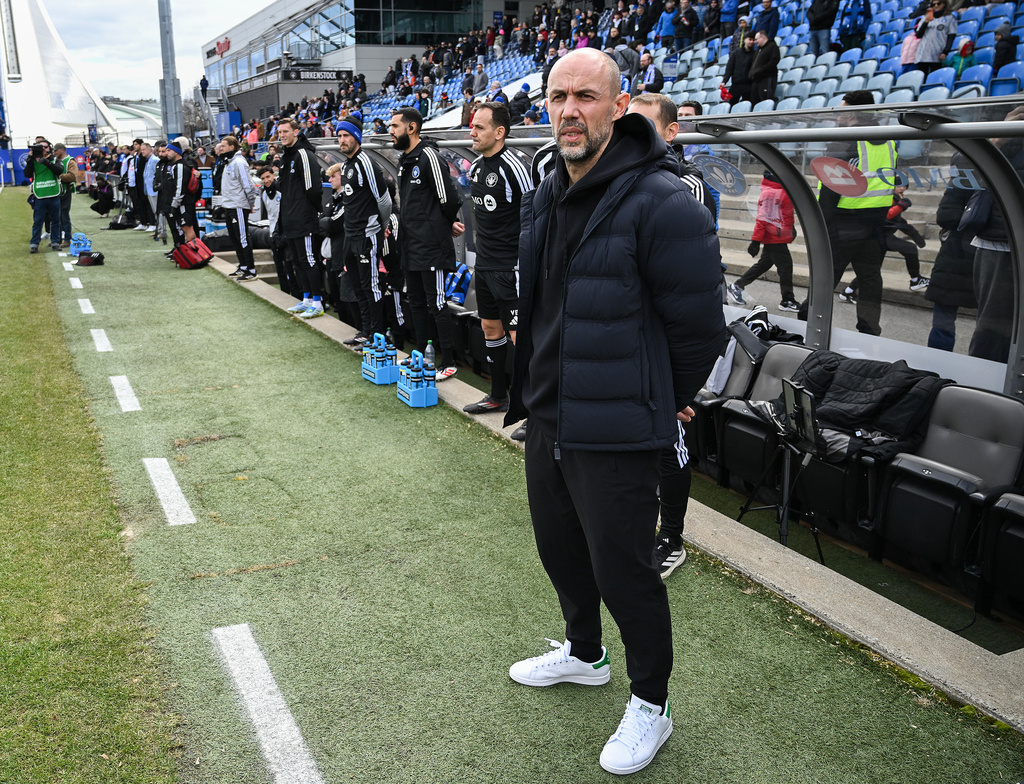 CF Montreal head coach Marco Donadel, foreground, looks on prior to an MLS soccer game against the Philadelphia Union in Montreal, Saturday, April 11, 2026. (Graham Hughes/The Canadian Press via AP)