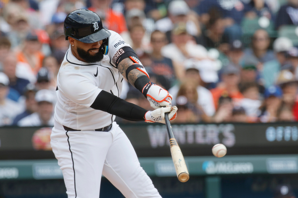 Detroit Tigers' Gleyber Torres singles against the Chicago White Sox during the second inning of a baseball game Sunday, Aug. 16, 2026, in Detroit. (AP Photo/Duane Burleson)