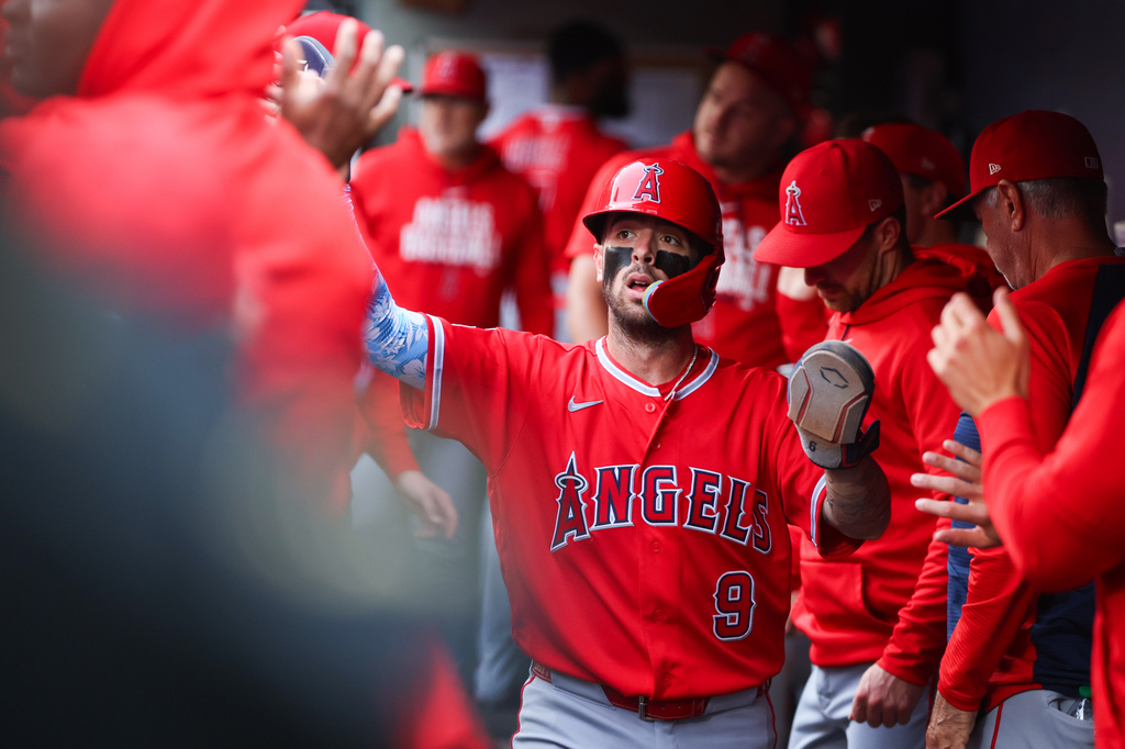 Los Angeles Angels' Zach Neto celebrates after scoring in the first inning of a baseball game against the Seattle Mariners, Monday, June 29, 2026, in Seattle. (AP Photo/Kevin Ng)
