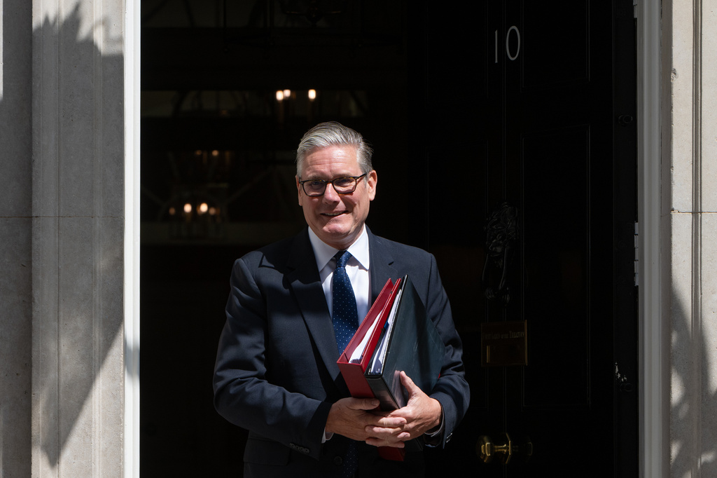 Britain's Prime Minister Keir Starmer leaves 10 Downing Street to attend Prime Minister's Questions at the House of Commons in London, Wednesday, July 15, 2026. (AP Photo/Thomas Krych)