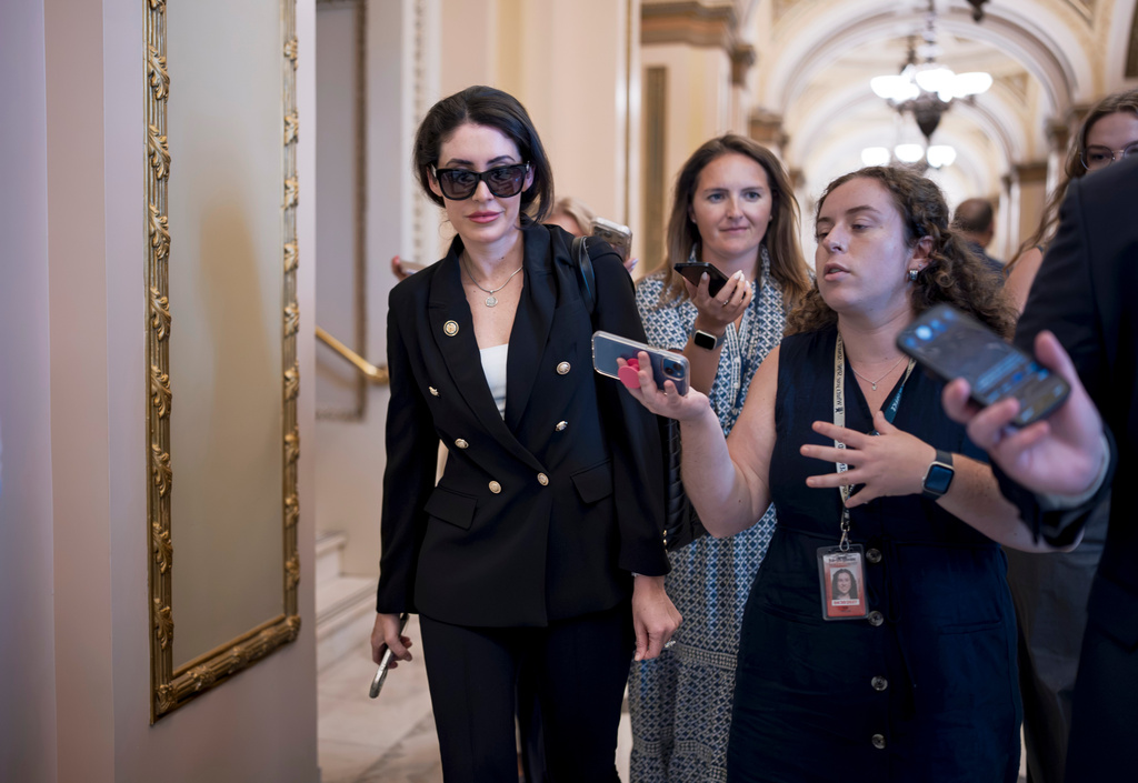 Rep. Anna Paulina Luna, R-Fla., is pursued by reporters as she leaves the chamber, at the Capitol in Washington, Tuesday, July 21, 2026. (AP Photo/J. Scott Applewhite)