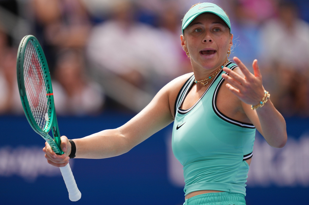 Amanda Anisimova, of the United States, reacts during the third round of the U.S. Open tennis championships against Anastasia Potapova, of Austria, Saturday, Sept. 5, 2026, in New York. (AP Photo/Kirsty Wigglesworth)