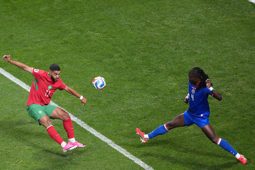 Morocco's Ismael Saibari (11) kicks the ball past Haiti's Ricardo Ade (4) during the World Cup Group C soccer match between Morocco and Haiti in Atlanta, Wednesday, June 24, 2026. (AP Photo/Jacob Kupferman)