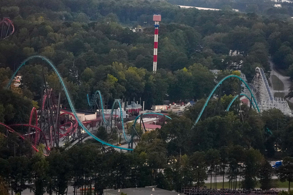 Attractions are seen at Six Flags Over Georgia, about 15 miles (24 kilometers) northwest of Atlanta, Thursday, Oct. 15, 2026, in Mableton. (AP Photo/Mike Stewart)
