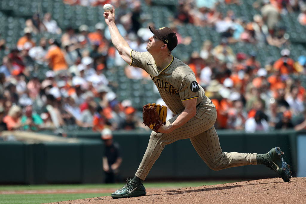 San Diego Padres pitcher Walker Buehler throws during the first inning of a baseball game against the Baltimore Orioles, Sunday, June 14, 2026, in Baltimore. (AP Photo/Daniel Kucin Jr.)