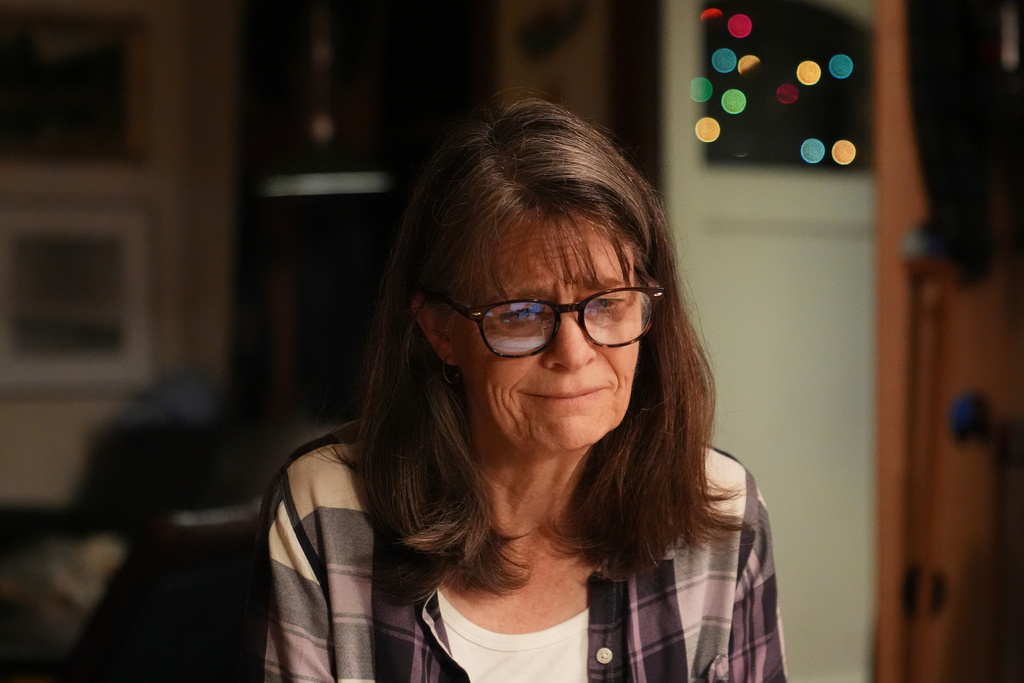 Mary E. Brunkow becomes emotional after hearing about winning a Nobel Prize in medicine for part of her work on peripheral immune tolerance, in Seattle, Monday, Oct. 6, 2025. (AP Photo/Lindsey Wasson)