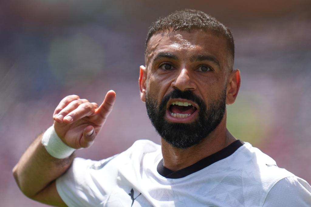 FILE - Egypt's Mohamed Salah gestures as he speaks to his teammates during the World Cup Group G soccer match between Belgium and Egypt in Seattle, Monday, June 15, 2026. (AP Photo/Manu Fernandez, File)
