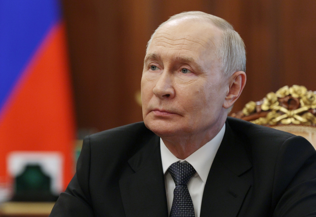 Russian President Vladimir Putin attends a meeting with Kaliningrad Region Governor Alexey Besprozvannykh in Moscow, Thursday, July 2, 2026. (Gavriil Grigorov, Sputnik, Kremlin Pool Photo via AP)