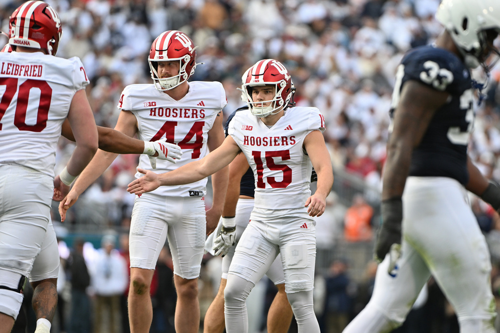 Indiana kicker Nicolas Radicic (15) celebrates a field goal during the third quarter of an NCAA college football game against Penn State, Saturday, Nov. 8, 2025, in State College, Pa. (AP Photo/Barry Reeger)