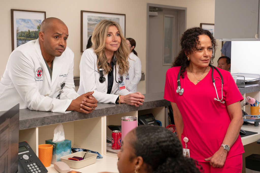 This image released by Disney shows, from left, Donald Faison, Sarah Chalke, and Judy Reyes in a scene from "Scrubs." (Jeff Weddell/Disney via AP)