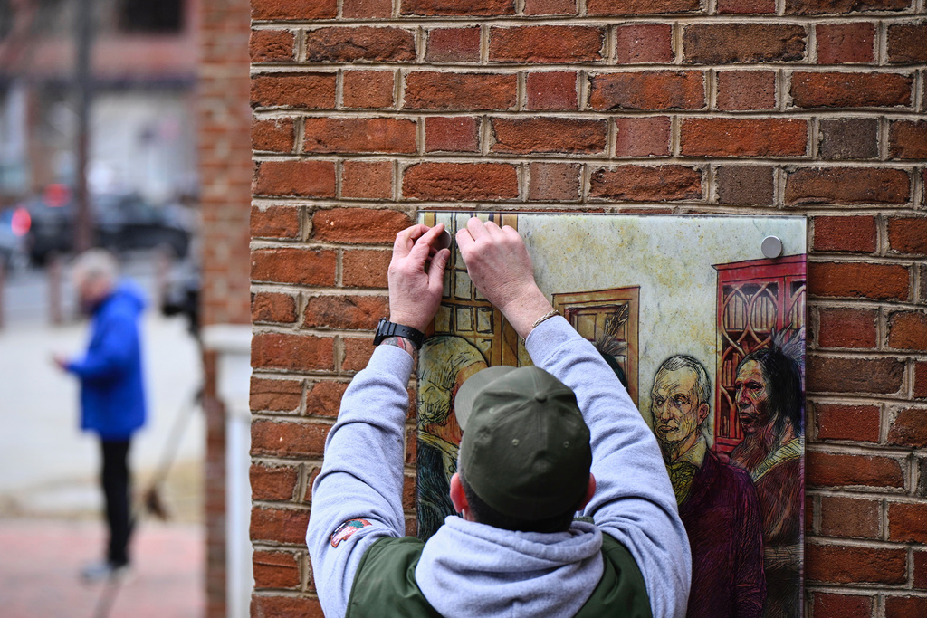 Panels that were part of an exhibit on slavery at the President's House Site in Philadelphia are put back Thursday, Feb. 19, 2026. (AP Photo/Joe Lamberti)